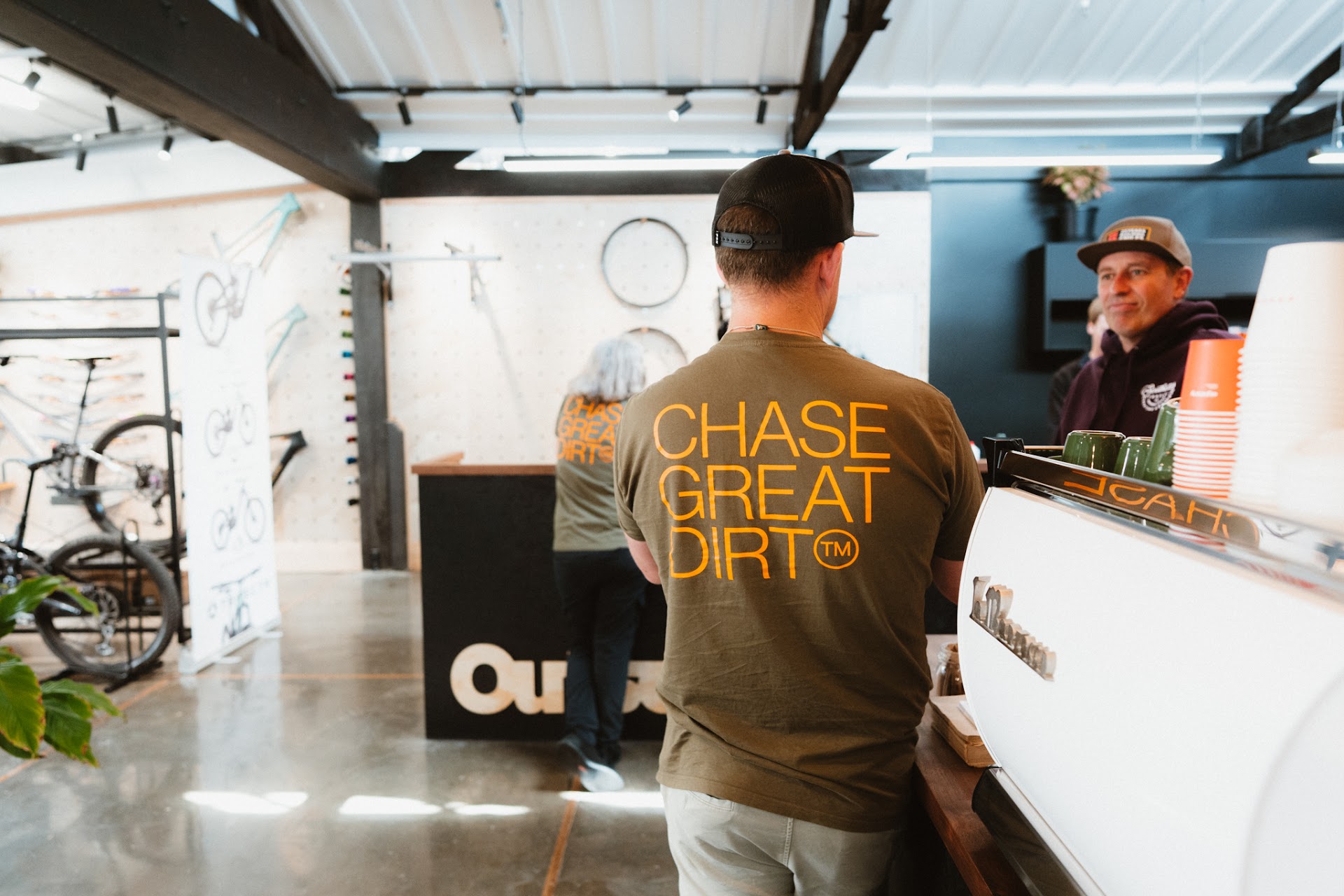 Customer ordering coffee at the Outset cafe counter