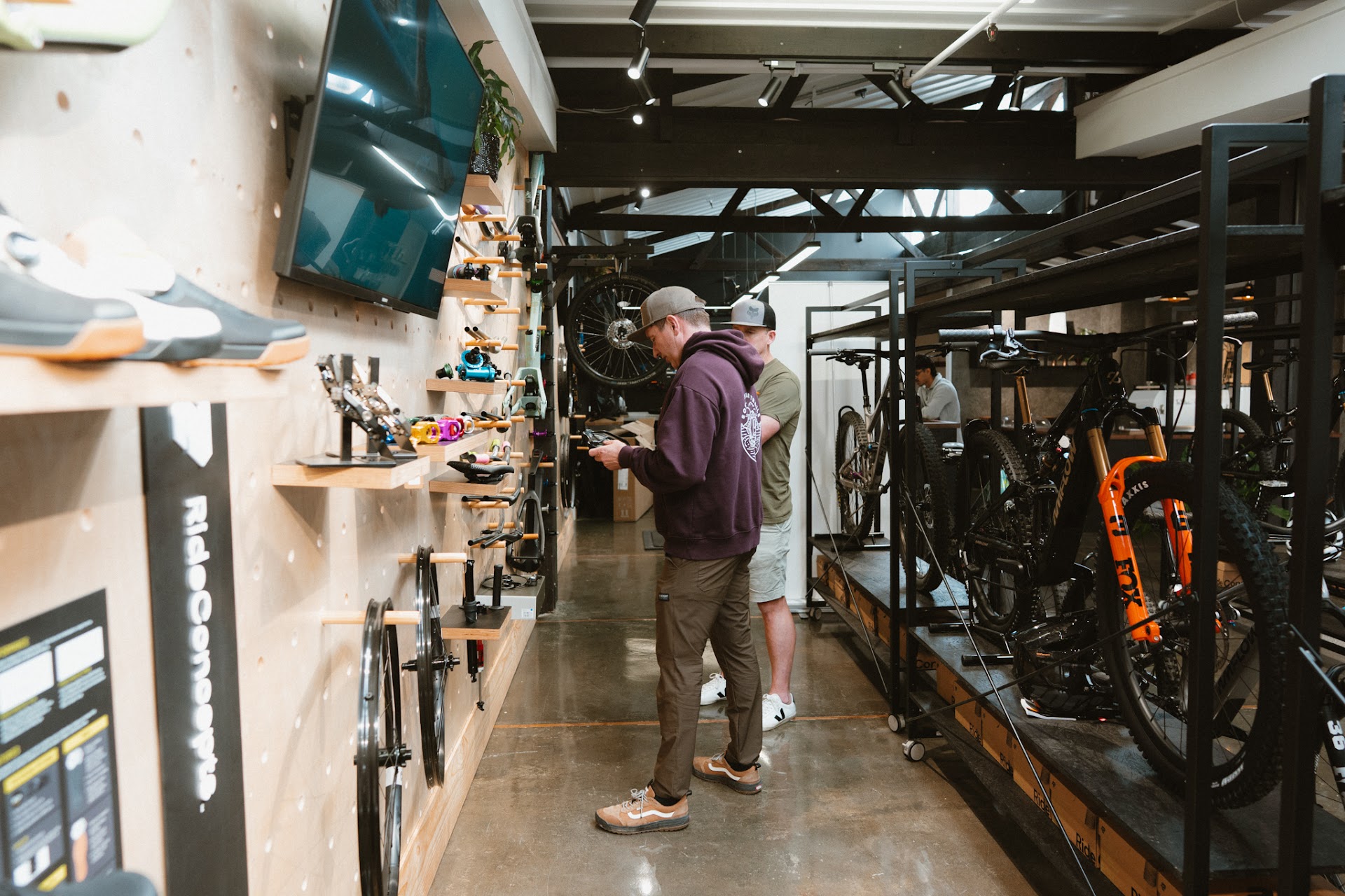 Bikes and components on display inside the Outset store in Auckland