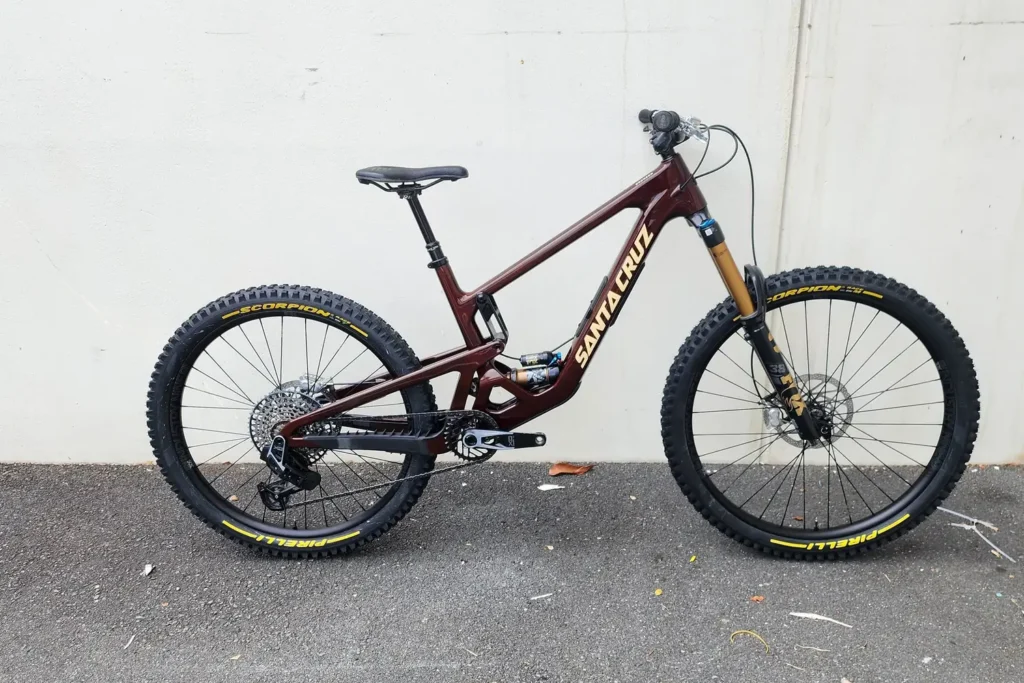 Red Santa Cruz full-suspension mountain bike built by Outset